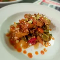 sesame garlic chicken. with sauteed bok choy, scallions, bell pepper,  brocoli, peas, chestnuts,  and baby corn.|James Kurtis Palenさん