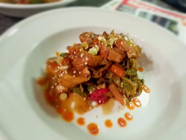 sesame garlic chicken. with sauteed bok choy, scallions, bell pepper,  brocoli, peas, chestnuts,  and baby corn.|James Kurtis Palenさん