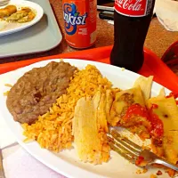 Snapdishの料理写真:Pork tamales, rice, refried beans, and a mexicoke.|Seanさん