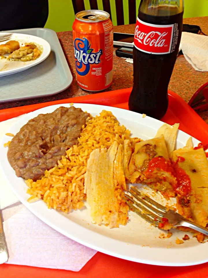 Snapdishの料理写真:Pork tamales, rice, refried beans, and a mexicoke.|Seanさん