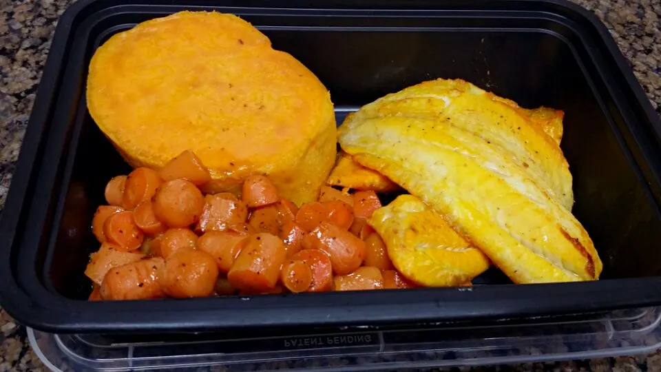 grilled tilapia, baked sweet potato & orange glazed carrots.|Melissaさん