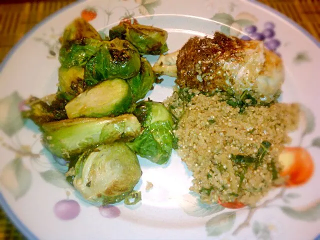 chicken stuffed with quinoa ginger/kale, wrappped with queso blanco and sauted brussels sprouts with garlic.|Jiraphon Gさん