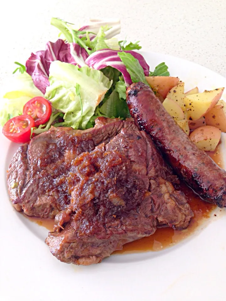 Snapdishの料理写真:Steak with onion sauce - chorizo, rosemary naked potato & salad|prinkcessさん