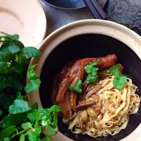 Braised duck feet,served with egg noodle