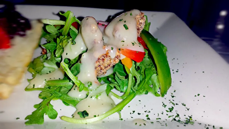 Fresh green salad with pickled Peppers cinnamon pecans and white chocolate vingerette dressing|yashica pさん