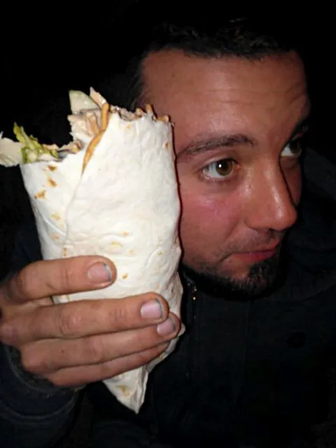 Snapdishの料理写真:Hubby's huge wrap with salad citrus chix. (as big a his head).|Polly Gelfusoさん