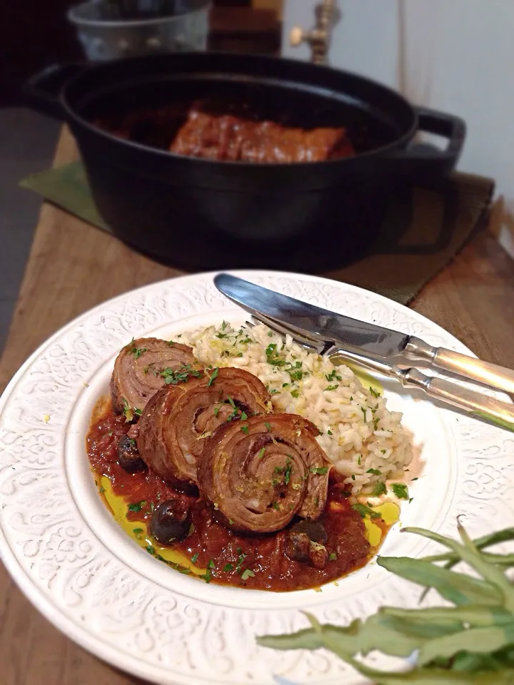 Lamb breast stuffed with anchovy ,braised in white wine,olive and tomato sauce.|rick chanさん