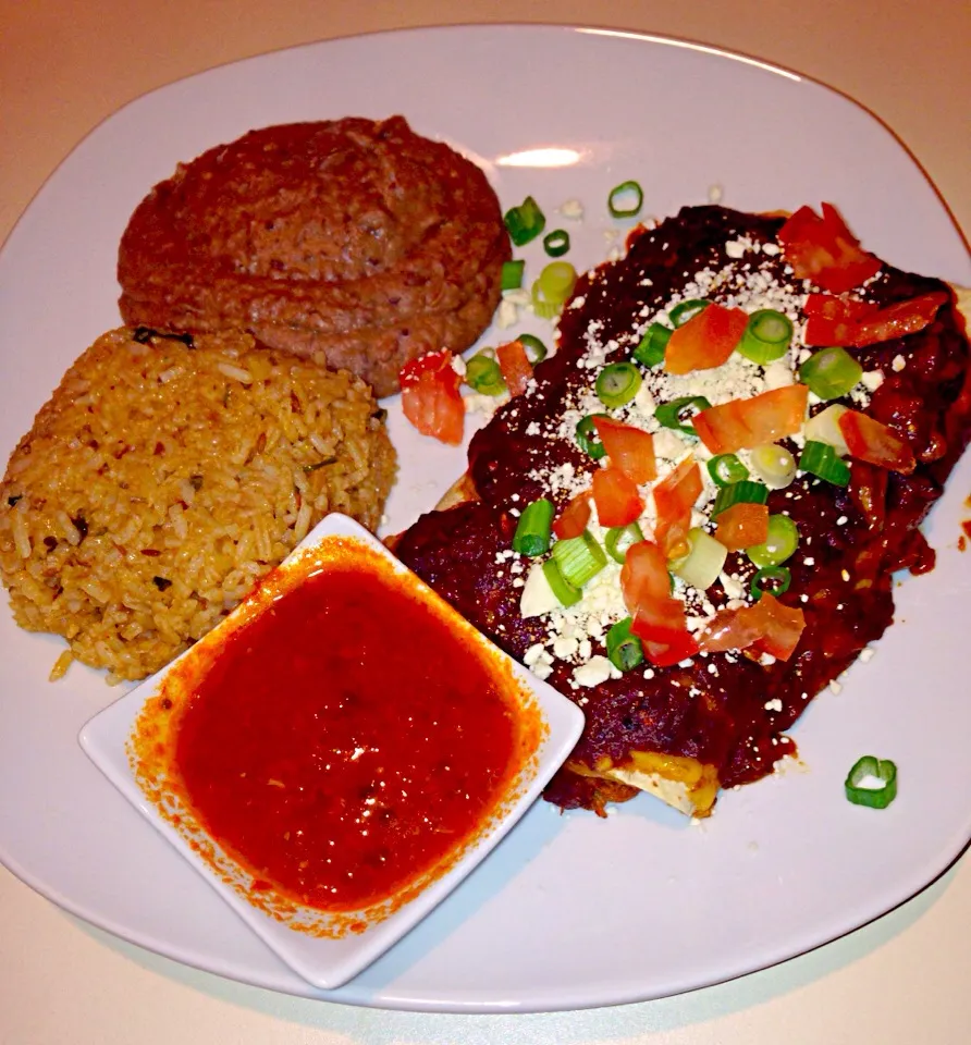 Shredded Beef enchiladas with chipotle mole, salsa brava, Mexican rice and roasted garlic refried beans|bertocci infernoさん