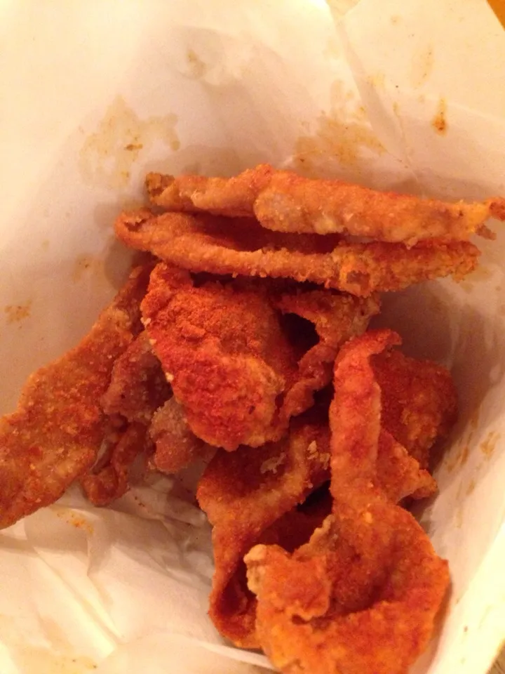 Snapdishの料理写真:Chatime's chicken skin covered in chilli powder|SJさん