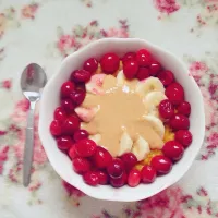 Snapdishの料理写真:Pumpkin pie oatmeal topped with warmed cranberries, banana slices and homemade coconut peanut butter|Rianneさん