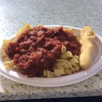 Snapdishの料理写真:Marinara pasta with breadstick|Evilash666さん