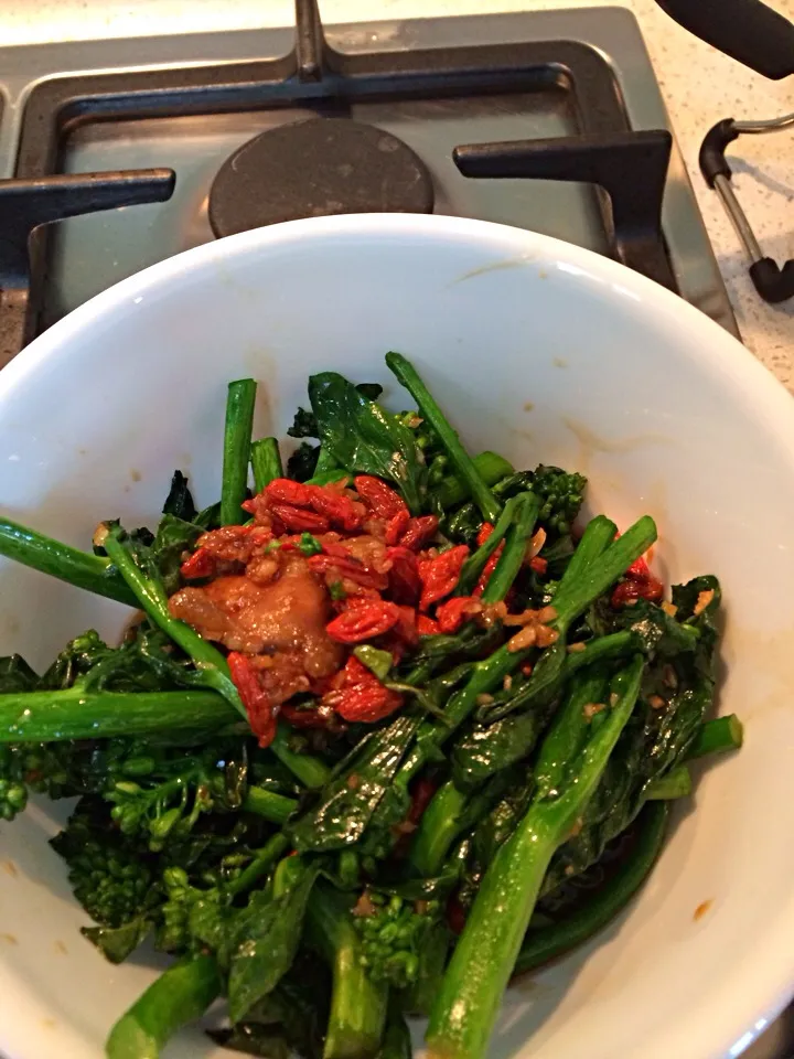 Snapdishの料理写真:Baby kailan stir fried in chicken fat with garlic and wolfberries|Ong Sor Fernさん