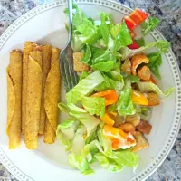 Snapdishの料理写真:chicken taquitos and salad|Whitney Kinnisonさん