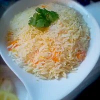 Snapdishの料理写真:Rice carottes and garlic|Tiffany Maiteeさん