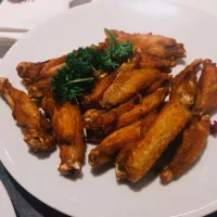 Snapdishの料理写真:greyhound famous fried chicken wings (deep fried marinated  mini chicken wings in fish sauce) /ปีกไก่แดดเดียวชุบน้ำปลาทอด|saravudhiさん