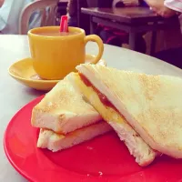 Snapdishの料理写真:Kaya toast and teh kurang manis (literally tea, less sweet)|Yi Ning Limさん