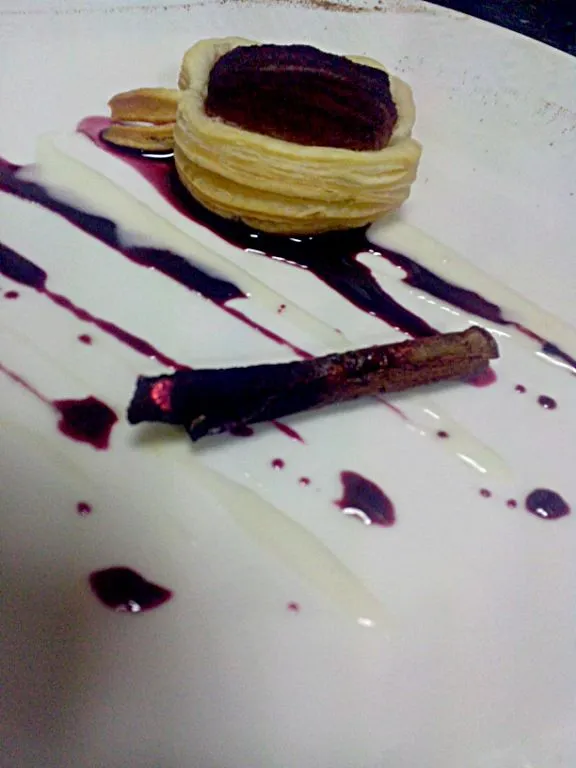 apple tart with red wine reduction and vanilla sauce...with burning cinnamon stick|avinashさん