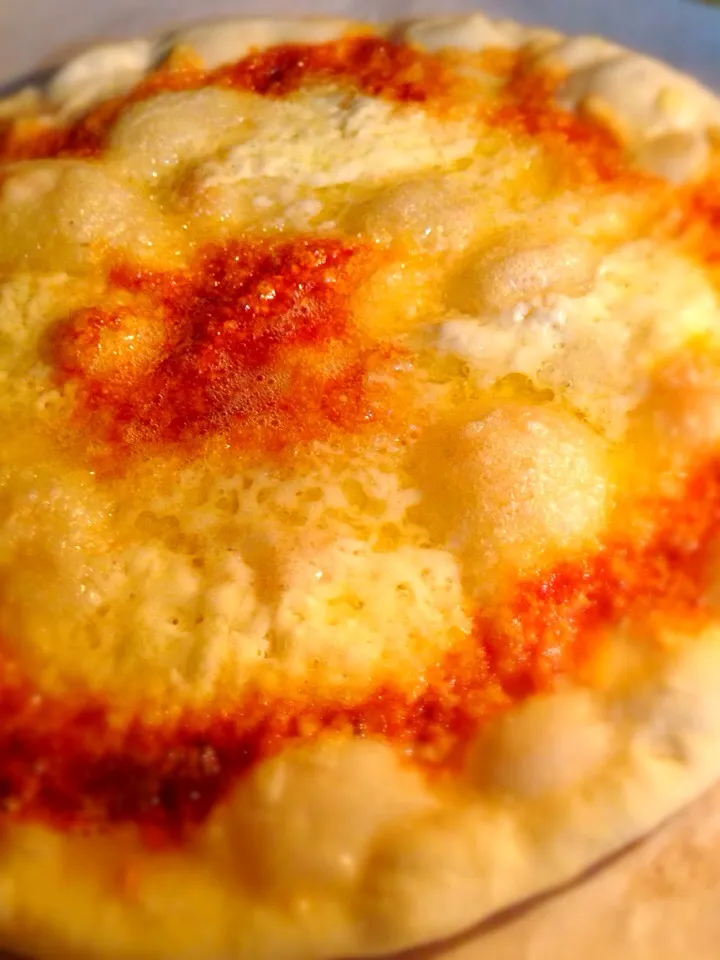 Rich cheese pizza|baku osawaさん