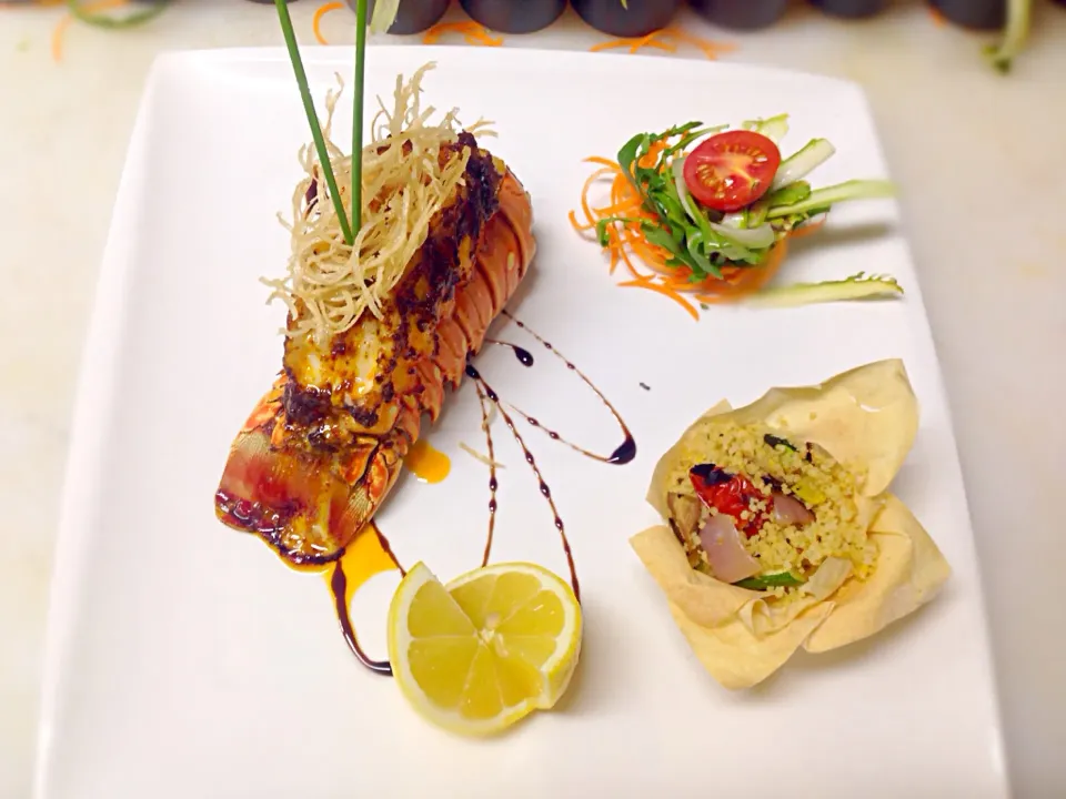 Broiled Lobster with garlic Butter, roasted Vegetable Couscous and Shaved Salad|arnold tecioさん