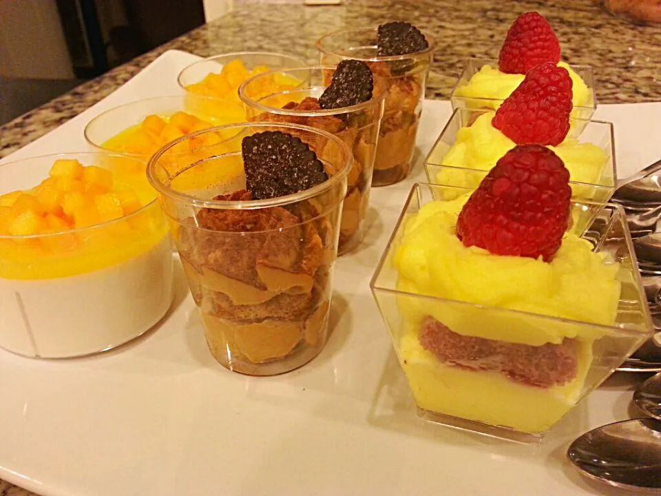 Mini dessert trio: coconut panna cottta with mango, tiramisu with Kahlua, tiramisu with Limoncello and Chambord.|Chef On Qさん