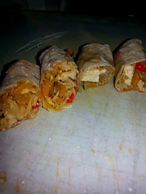 homemade baked chix eggrolls.  And homemade tofu eggrolls.  both with cabbage,  onion,  And pepper.|Polly Gelfusoさん