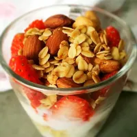 Breakfast parfait with homemade granola and strawberry & banana