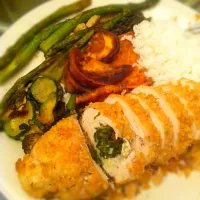 Snapdishの料理写真:Cilantro stuffed ritzy 🐔Chicken breast 🍗with roasted zucchini ,asparagus,and sweet potato wedges🍠|Cristinaさん