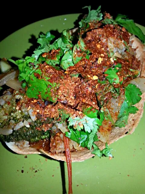 my oriental inspired taco. with fresh lime,  fresh cilantro,  fried rice,  tofu, and veggies.|Polly Gelfusoさん