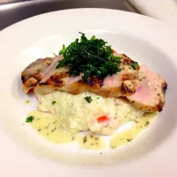 Grilled pork loin over lemon thyme risotto with fried parsley|phil strattonさん