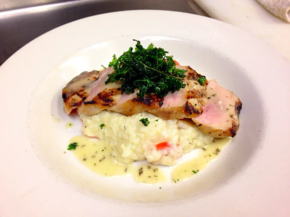 Snapdishの料理写真:Grilled pork loin over lemon thyme risotto with fried parsley|phil strattonさん