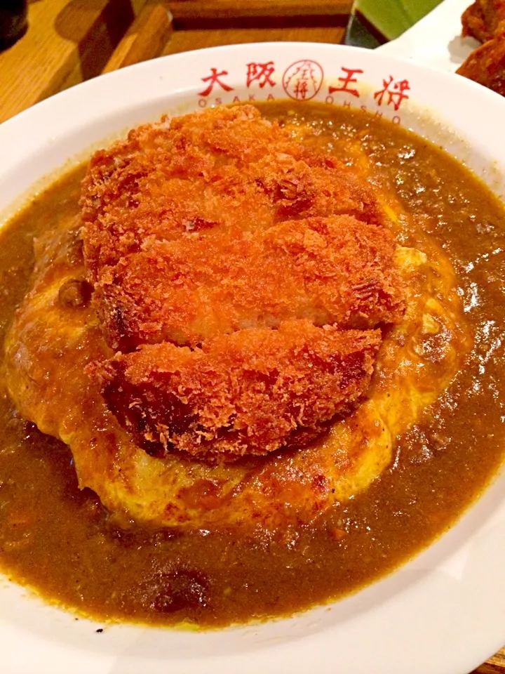 Fried pork chop with rice Omelette in Japanese curry sauce|wu poさん