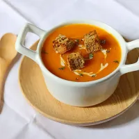 Pumpkin soup with pumpkin seed bread croutons