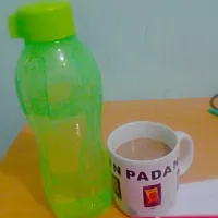 Satnite latte with pure mineral water|Gebry Ayu Diwandaniさん