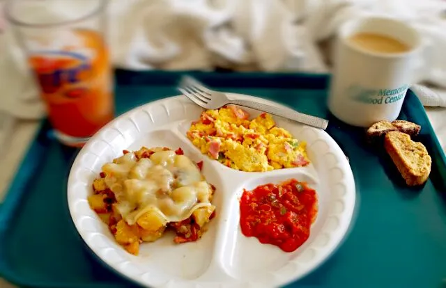 Home fries with turky bacon a slice of Swiss cheese on top ,scrambled eggs with ham and peppers onion and cheese with salsa|christl babcockさん