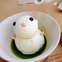 Little snowman with matcha latte