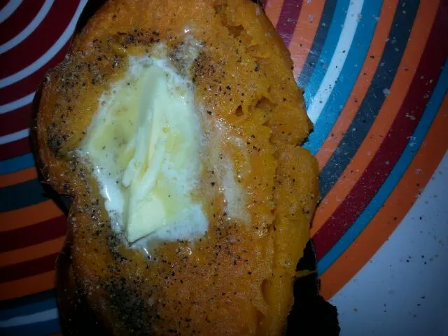 my Easter sweet potato. with tons of butter and salt and pepper.|Polly Gelfusoさん