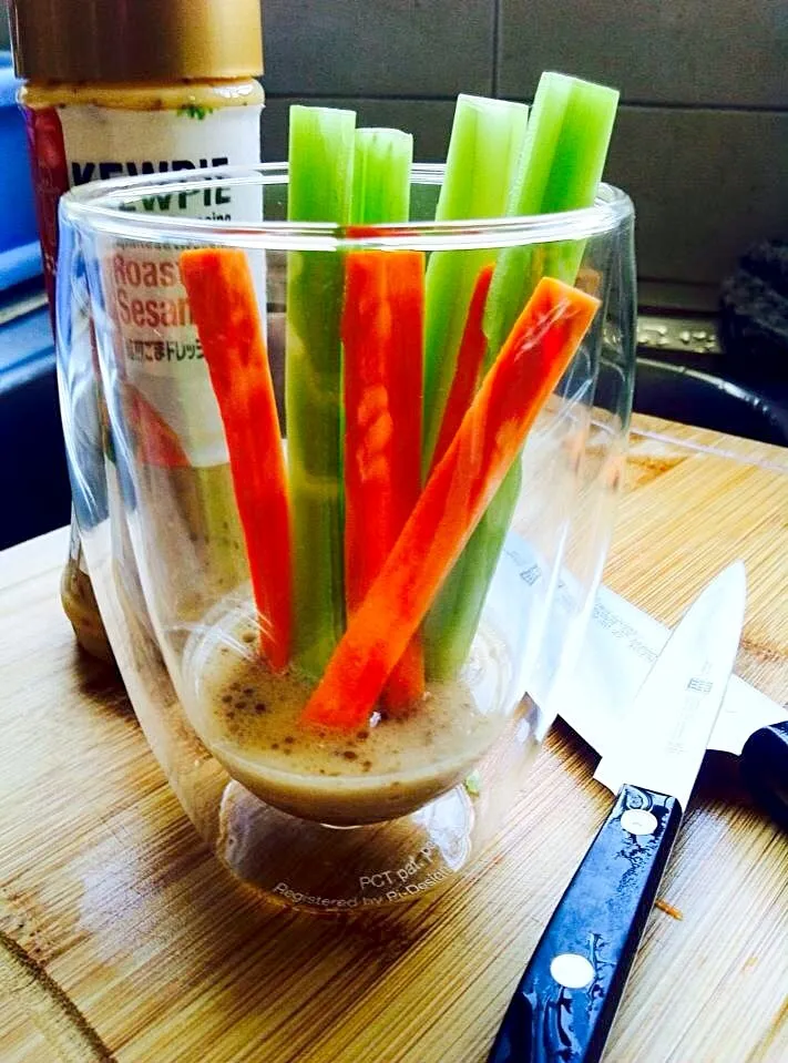 Fresh Celery and Carrot sticks with roasted sesame dipping sauce.|samantha wさん