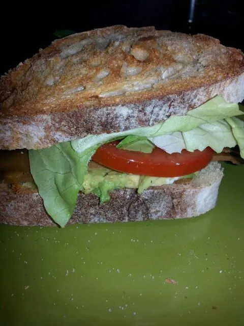 Dinner.  garlic chibatta with"froastbeef", lettuce, tomato, avocado, and chive and onion cream chz.|Polly Gelfusoさん