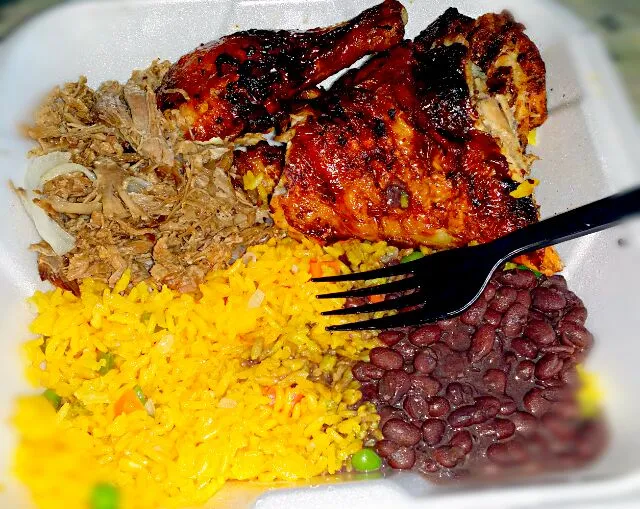 Snapdishの料理写真:tropical chicken roasted pork  yellow rice  black beans and plantains|christl babcockさん