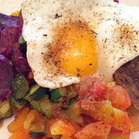 Sunny sideup Egg over Tenderloin, sauteed tomatoes, zucchini and sweet potatoes|Agnes Tjanさん