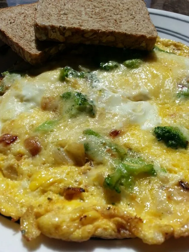 Snapdishの料理写真:Broccoli & Parmesan Omelet with Sprouted Grain Toast|Melissa Marie Hallさん