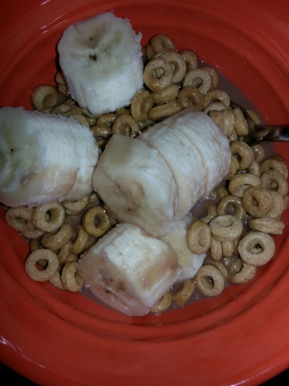 banana  cherrio's with banana and chocolate almond milk.|Polly Gelfusoさん