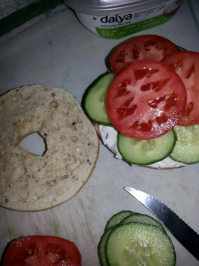 multigrain bagel with cream chz, tomato, and cucumber=lunch.|Polly Gelfusoさん