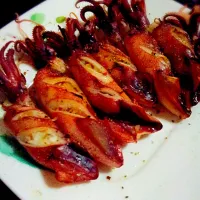 Snapdishの料理写真:grilled small squid with onion and tomato stuffing|luvsie juanさん