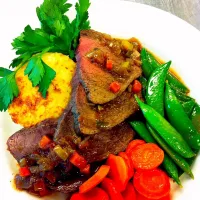 Beef Daub, baked gruyere grits, glazed sugar snap peas and carrots|Chef Myra Tennilleさん