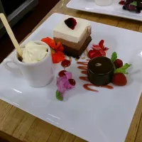 Pot de creme(cup), 3 chocolate moose, and chocolate petite four|American Integratedさん