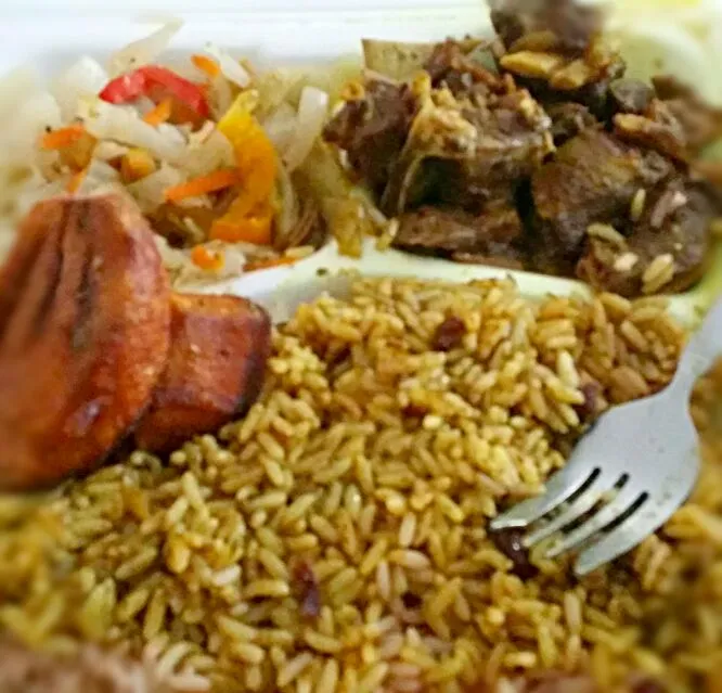 Snapdishの料理写真:Curry goat  cabbage rice and peas|christl babcockさん