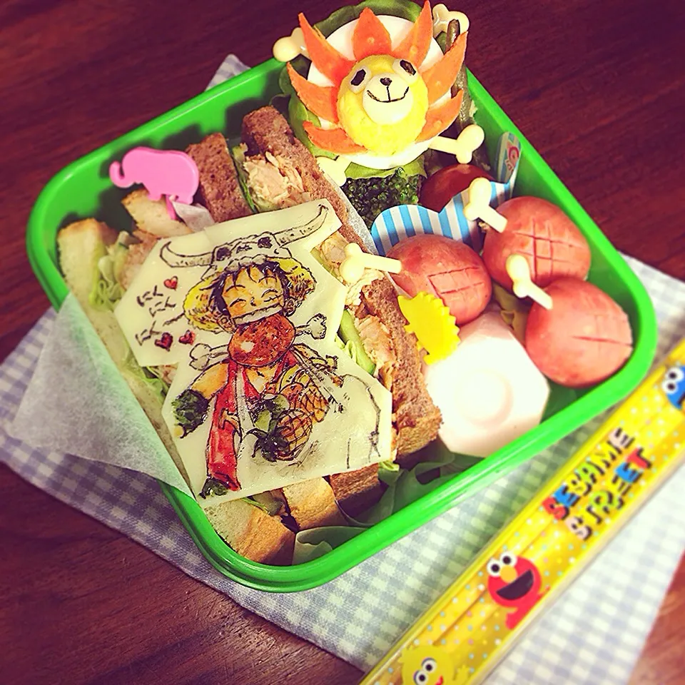 ONE PIECE 💀 Smiling Luffy through a mouthful of Bony chop!  Bento.  ONE PIECE💀骨つき肉大好き💕もぐもぐルフィ弁当|Yuka Nakataさん