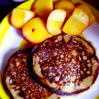 Snapdishの料理写真:Banana oat pancakes with peaches for brunch!|annettemrodriguezさん