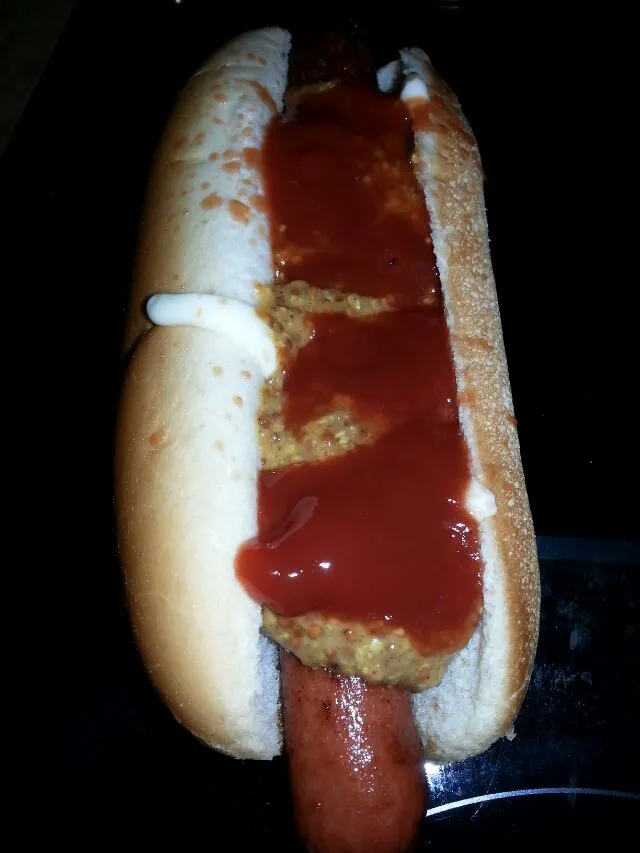 hot dog With lots of ketchup and mustard.|Polly Gelfusoさん